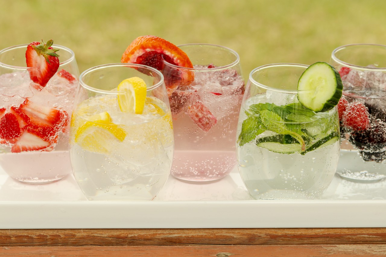 Summertime Spritzers in glasses on white tray