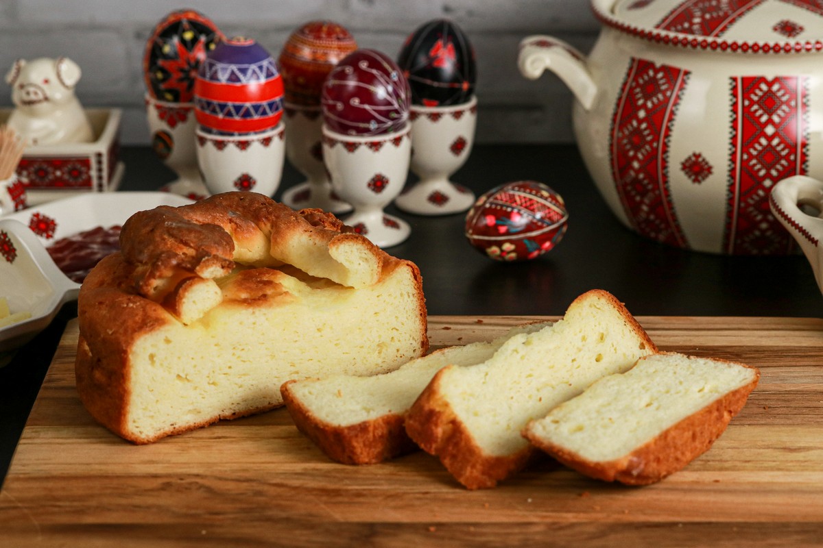 Gluten-free Easter Paska egg bread sliced on chopping board