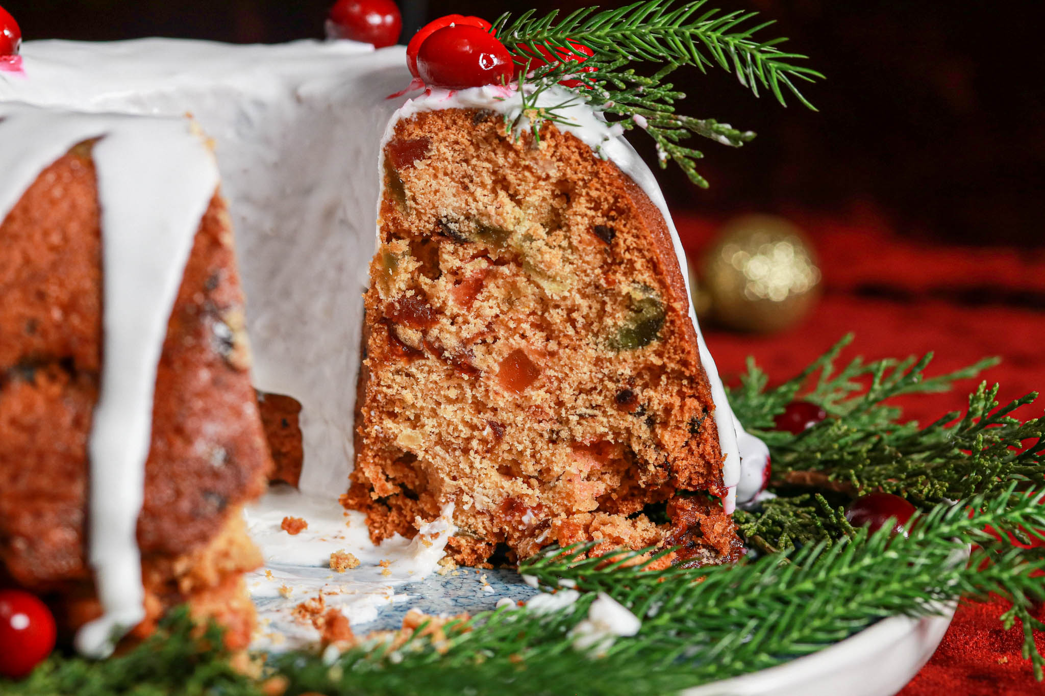 Gluten-free Fruit Cake Bundt on red velvet