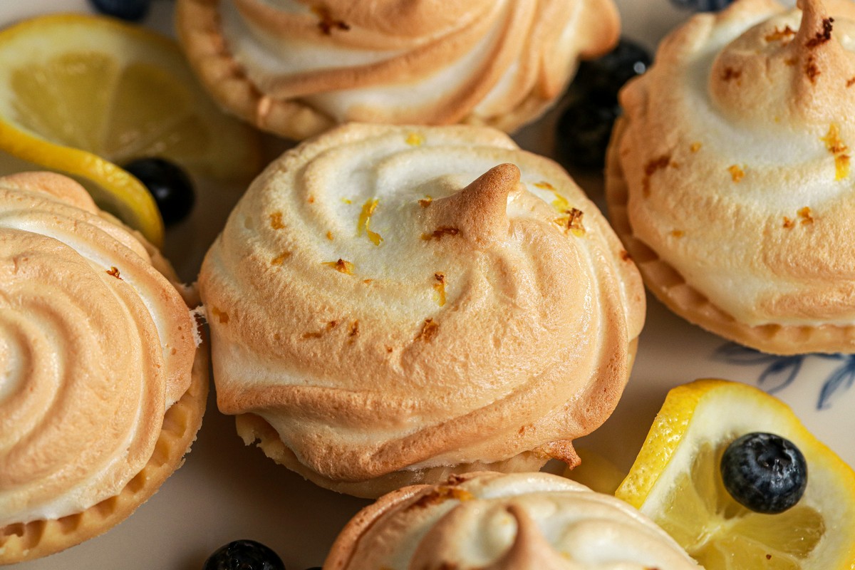 Gluten-free Meringue Tarts on a blue & white plate