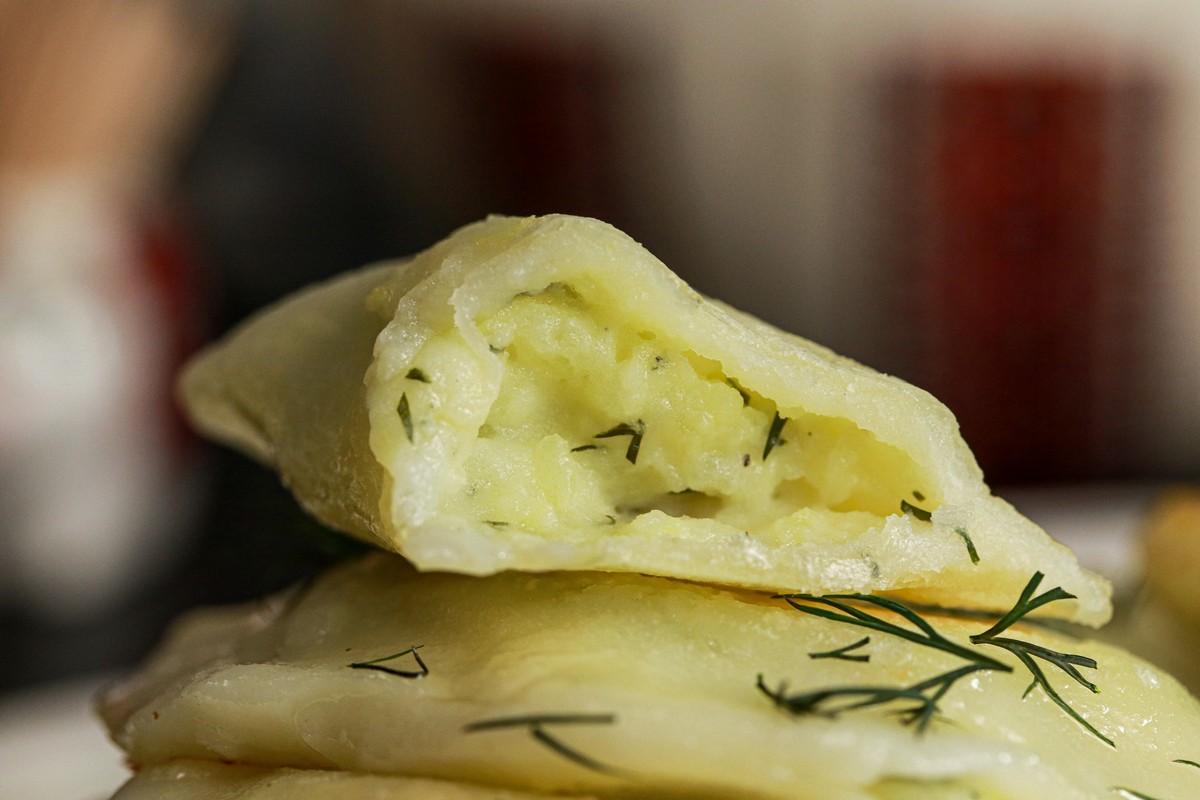 Pierogi close up made with cream cheese potato on Ukrainnian dish