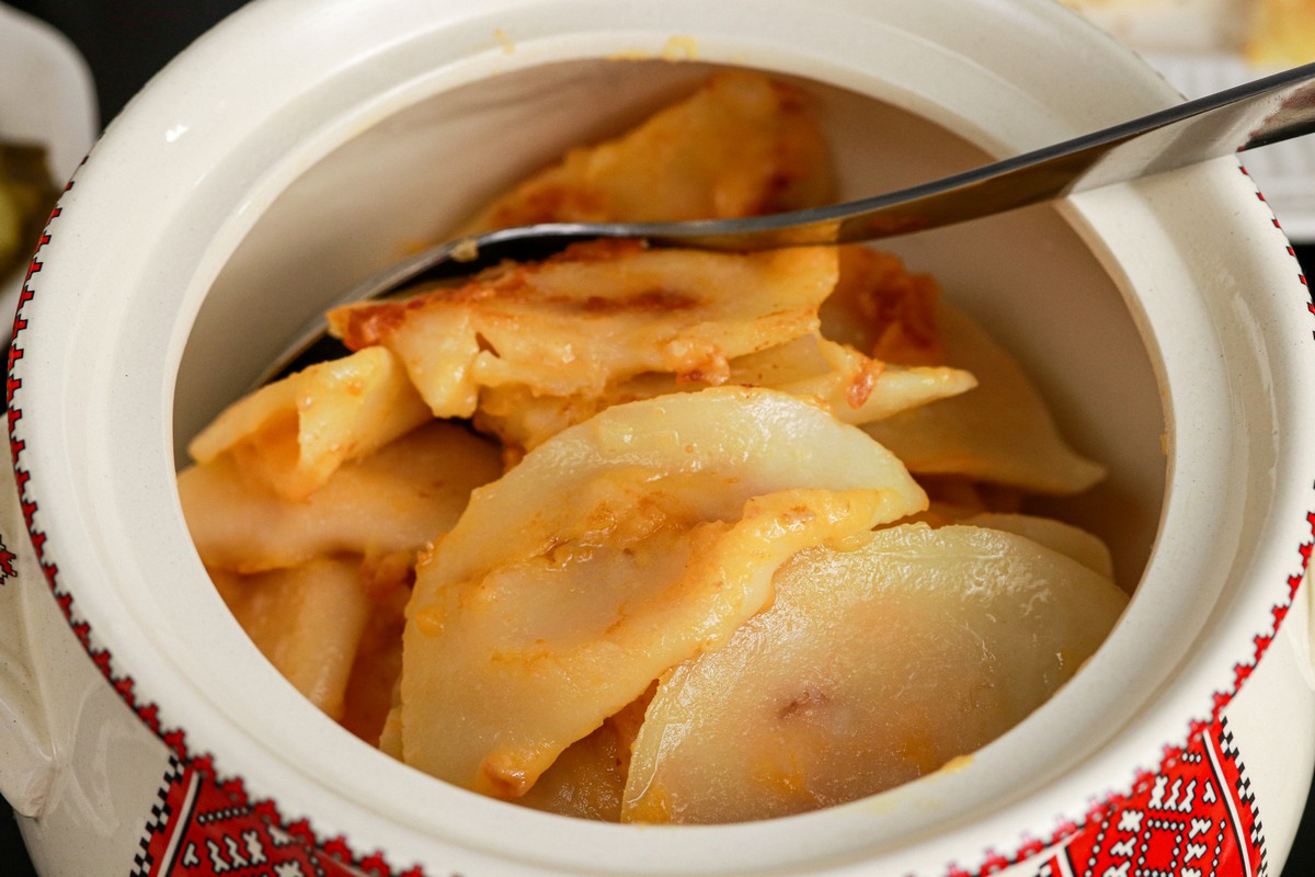 Gluten-free cheddar bacon pierogies on Ukrainian dishes