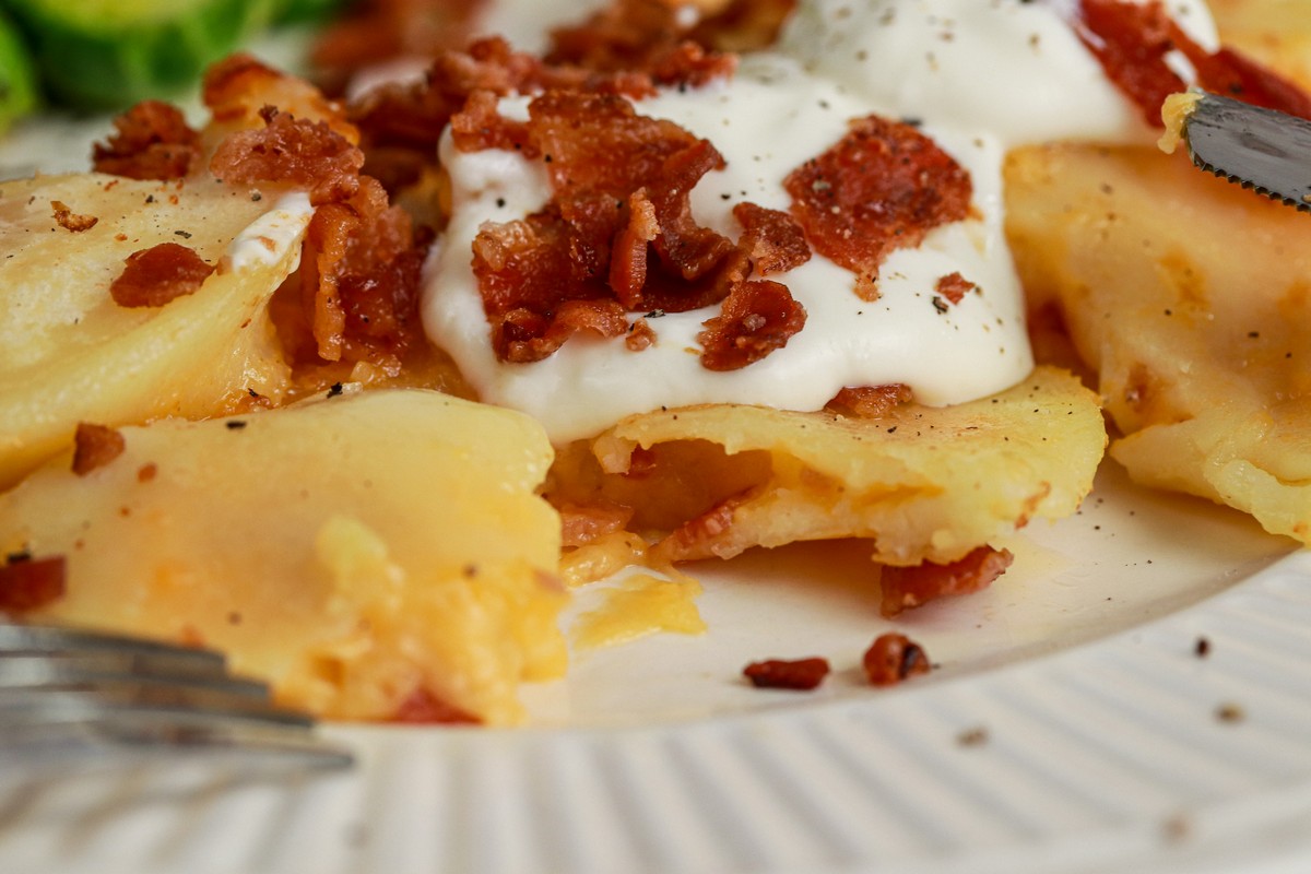 Gluten-free cheddar bacon pierogies on Ukrainian dishes