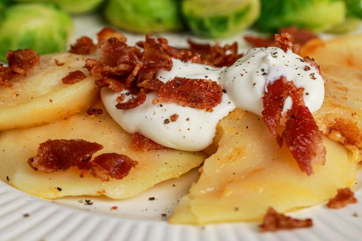 Gluten-free cheddar bacon pierogies on Ukrainian dishes
