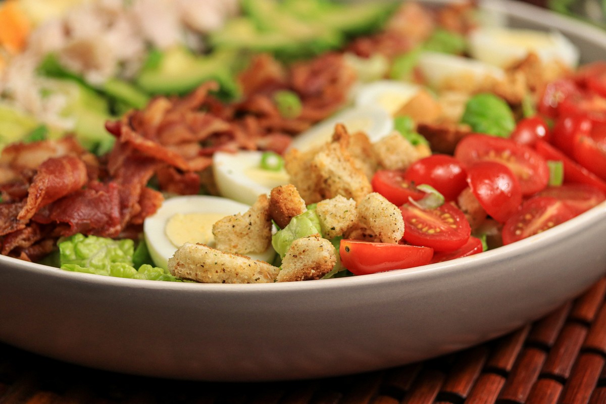 stripes of gluten-free cobb salad egg tomatoes turkey bacon 