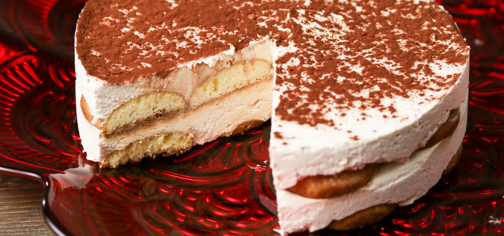 Gluten-free Tiramisu on red velvet background